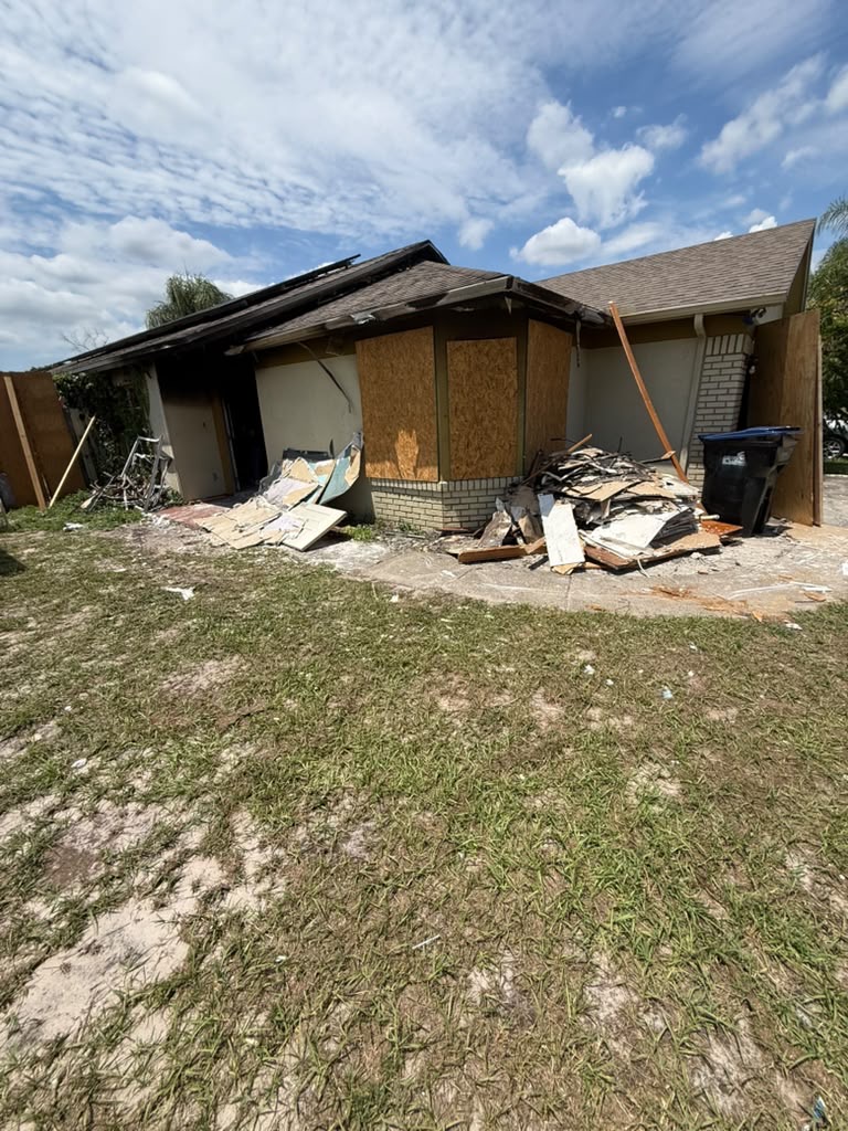 Property cleanout and debris-removal scene from the Hugo restoration media library, view 01