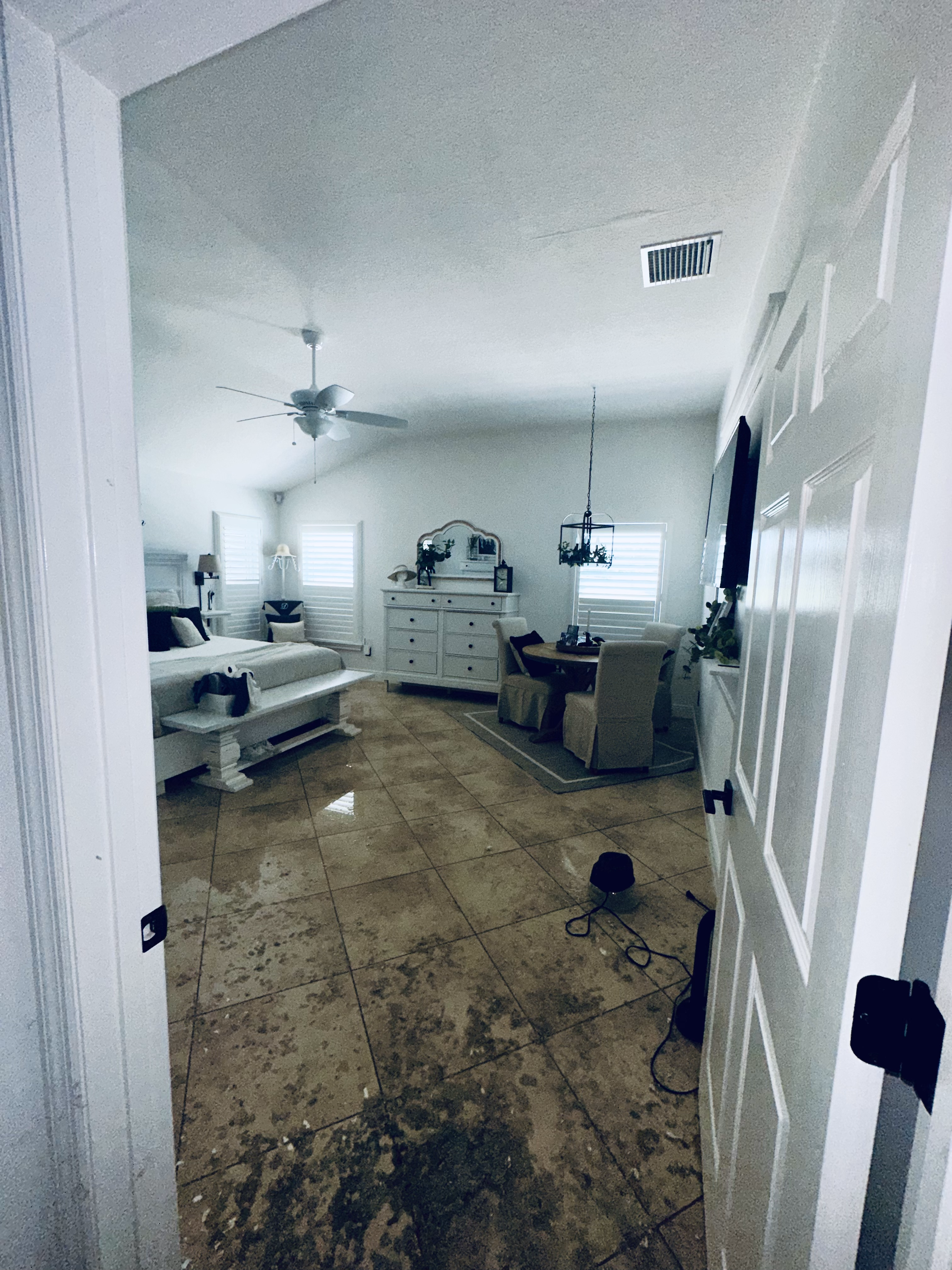 Air movers in a living room with flooring removed