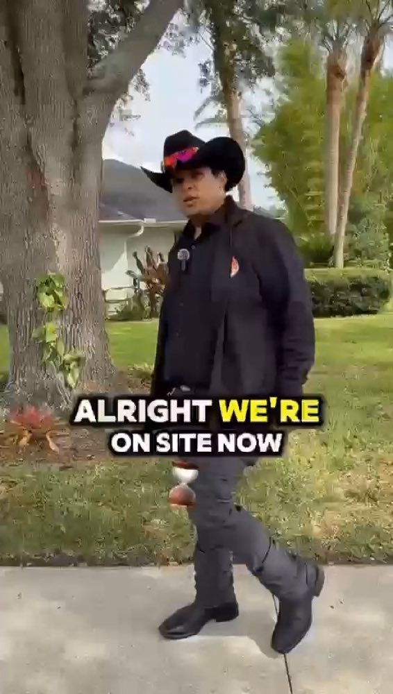 Hugo team member walking outside a property