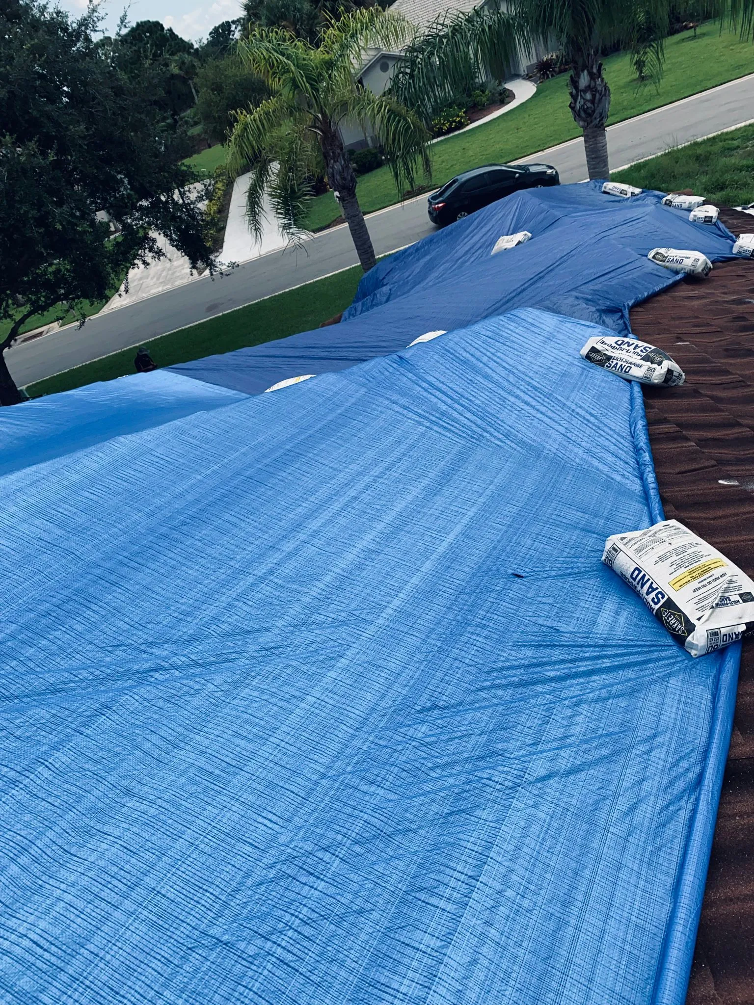Storm tarping and roof protection work